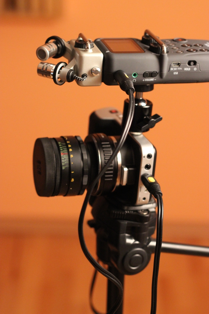 Blackmagic Pocket Cinema Camera, Helios 44-2 58mm F/2 lens, a cheap M42-MD adapter and RJ Lens Turbo MD-M4/3 focal reducer. Zoom H5 field recorder on top.